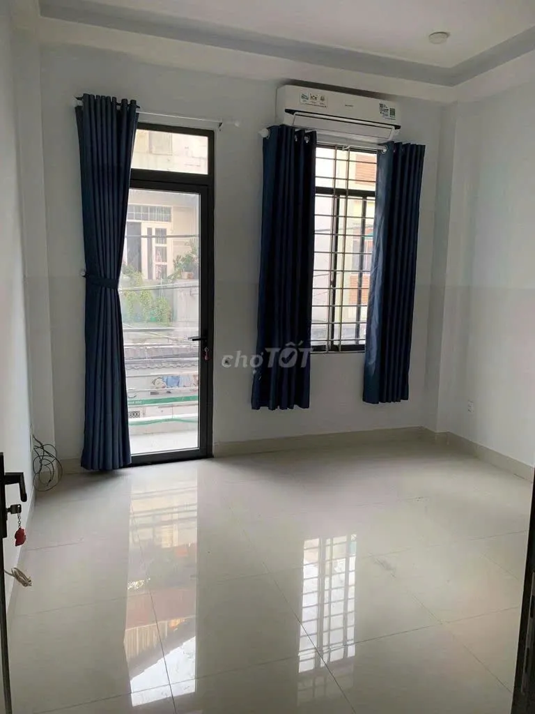 Nhà 4x9 HXH Đồng Xoài 4 tầng 3PN bancon